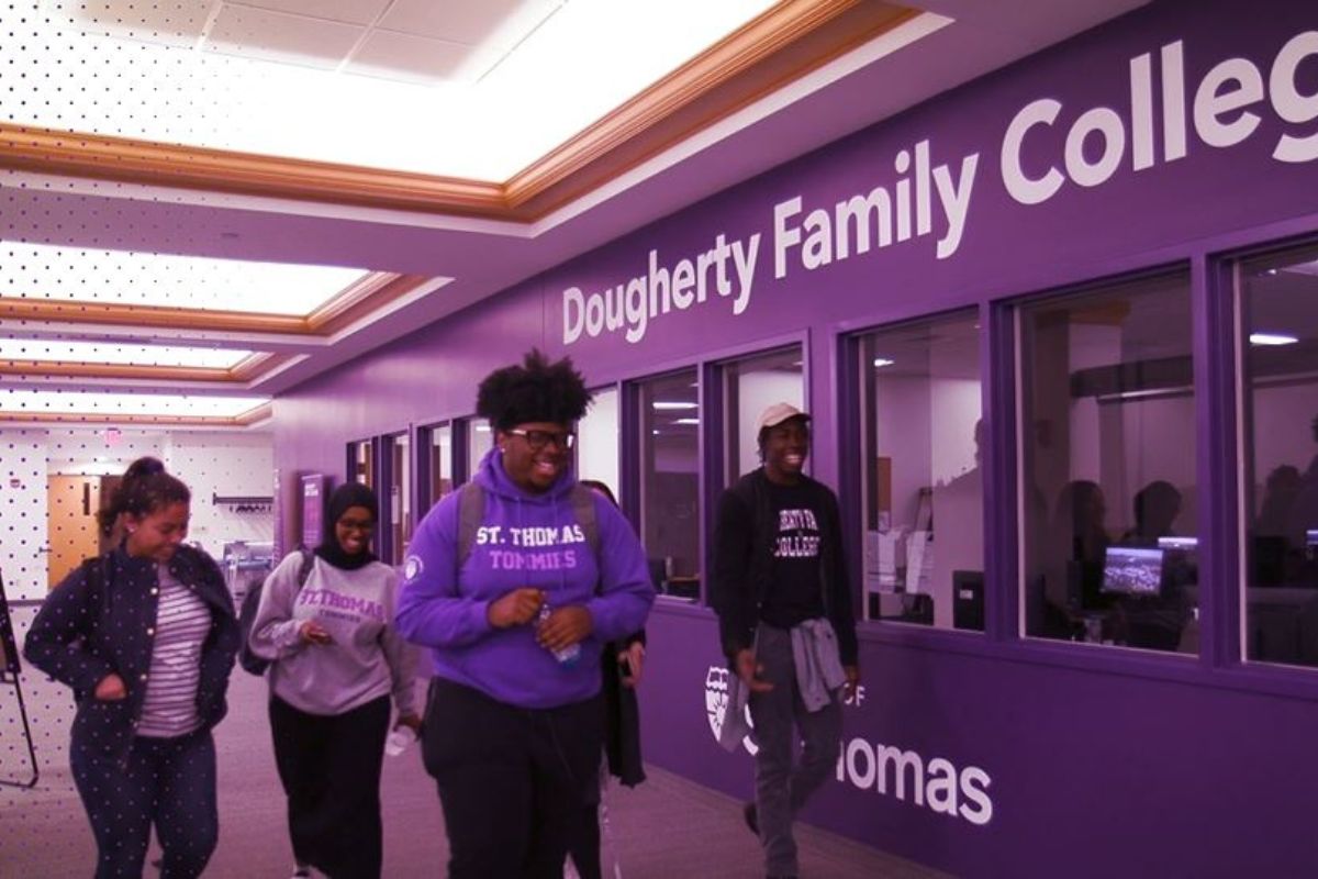 students walking down hallway in DFC Commons